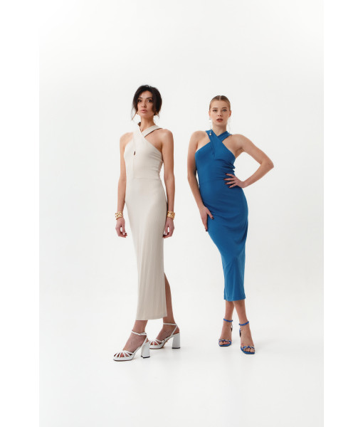 Knitted beige dress with an original bodice