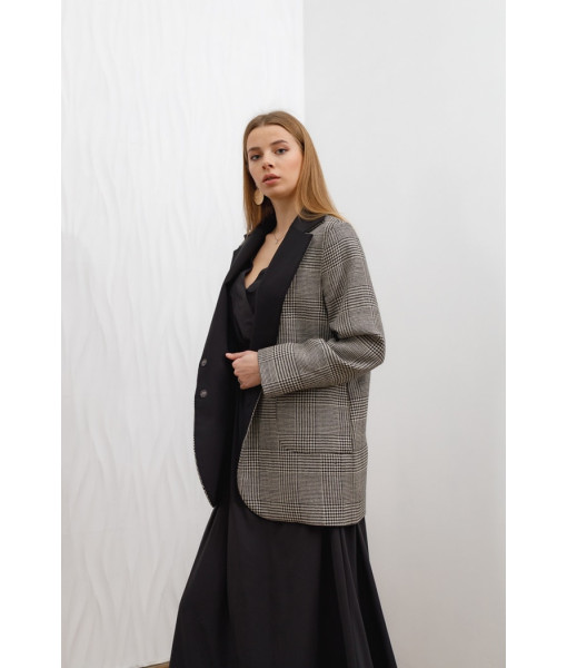 The jacket is warm in a check