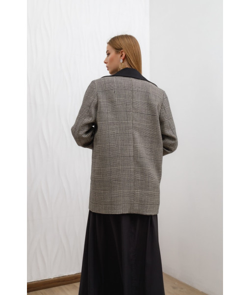 The jacket is warm in a check