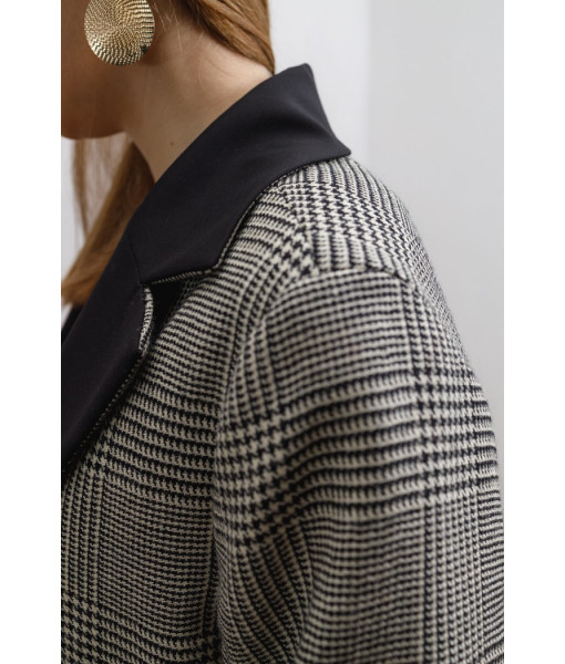 The jacket is warm in a check